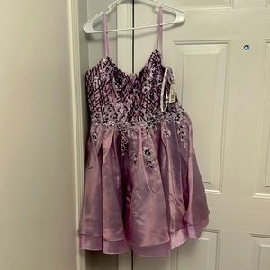 Beautiful purple gown.  Never worn.